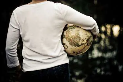 Woman Holding Globe