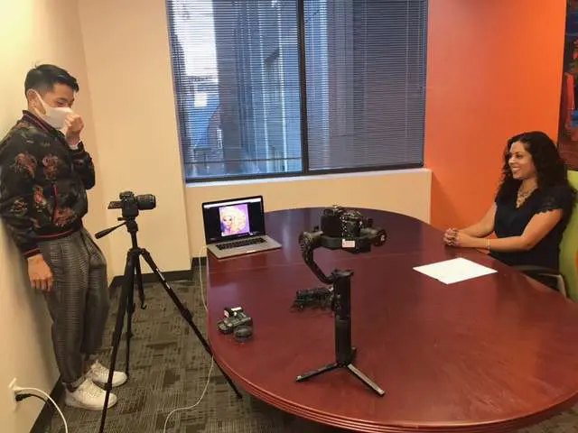 Alisha being interviewed