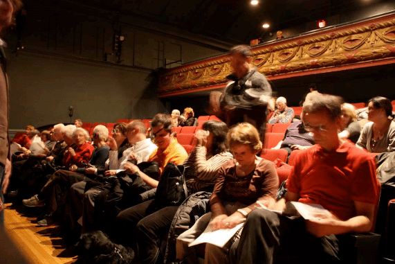 Blind patrons among the audience enjoying audio described performance of Bethune at Factory Theatre